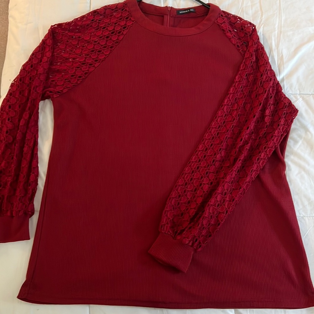 Burgundy long sleeve blouse.